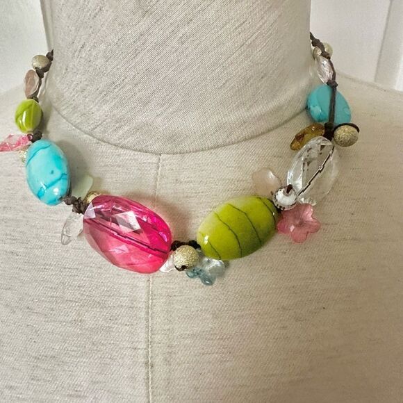 Colorful beaded necklace on brown cord - Picture 1 of 7